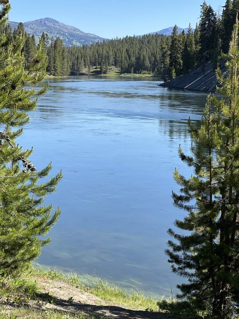 Leaving Yellowstone through Grand Teton, suddenly we'd come across lakes like this one, spectacular